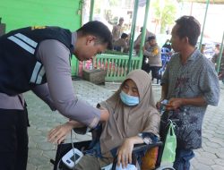 Antusias Warga Sangkulirang Ikuti Bakti Kesehatan Polres Kutai Timur