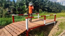 Wujud Pengabdian Kepada Masyarakat, Polres Kutim Rampungkan Pembangunan Jembatan Merah Putih Presisi di Jalan H. Abdullah